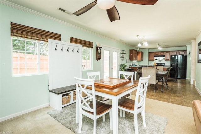 304 Walnut Crossing Dr, Whitsett, NC 27377 - dining space featuring ornamental molding, baseboards, and a ceiling fan