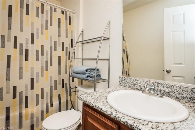 304 Walnut Crossing Dr, Whitsett, NC 27377 - bathroom featuring toilet, vanity, and a shower with curtain