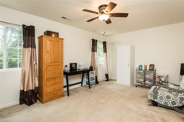 304 Walnut Crossing Dr, Whitsett, NC 27377 - sitting room with light colored carpet, ceiling fan, and baseboards