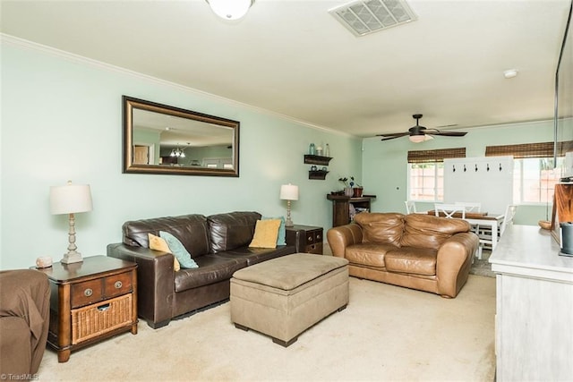 304 Walnut Crossing Dr, Whitsett, NC 27377 - living room featuring ornamental molding, light colored carpet, and ceiling fan