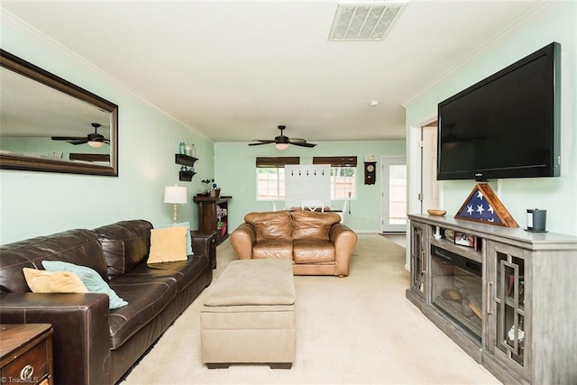 304 Walnut Crossing Dr, Whitsett, NC 27377 - living area with a ceiling fan, carpet, and crown molding