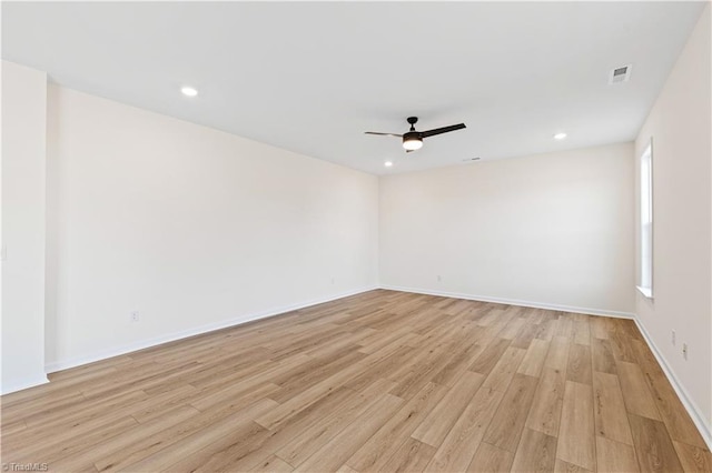 unfurnished room with light wood finished floors, recessed lighting, baseboards, and ceiling fan