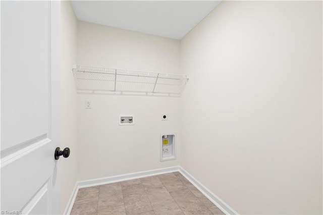 washroom with laundry area, hookup for a washing machine, baseboards, and hookup for an electric dryer