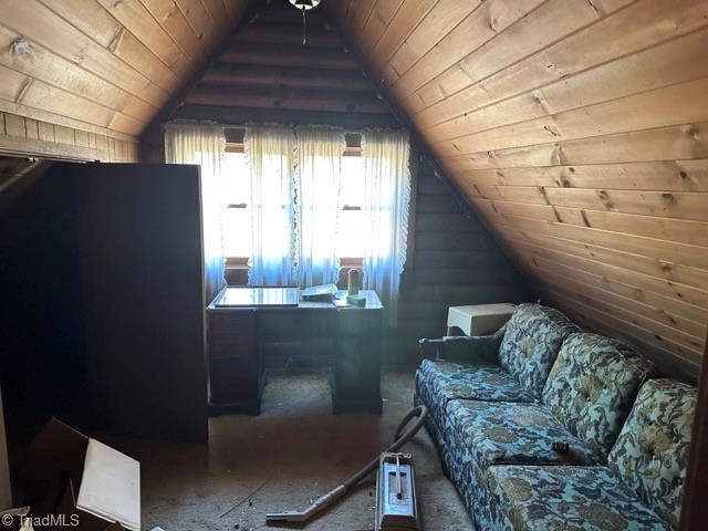 additional living space with lofted ceiling and wooden ceiling