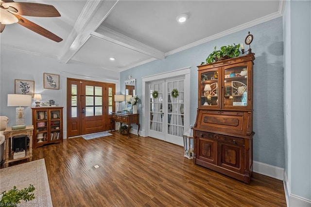 entryway with a ceiling fan, beam ceiling, dark wood finished floors, and french doors
