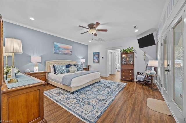 bedroom with visible vents, recessed lighting, and wood finished floors