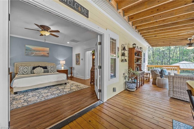 exterior space with visible vents, a ceiling fan, and an outdoor living space