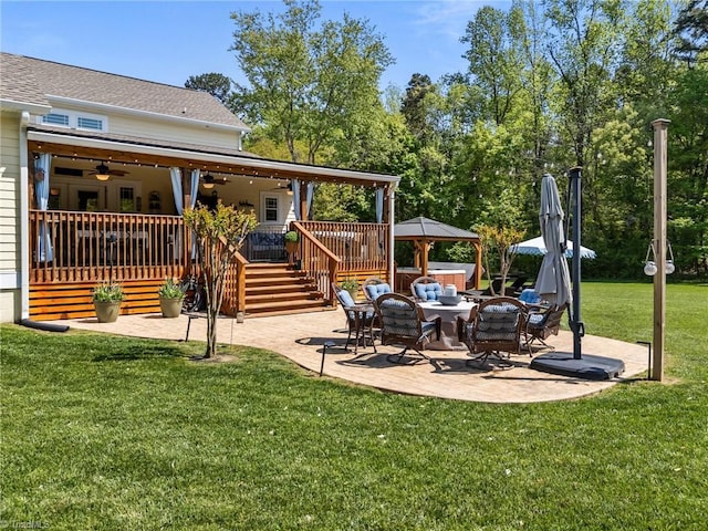 view of yard featuring a gazebo, a patio, and ceiling fan