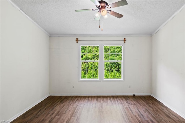 103 Forest Dr, King, NC 27021 - spare room with a textured ceiling, wood finished floors, ornamental molding, and a ceiling fan