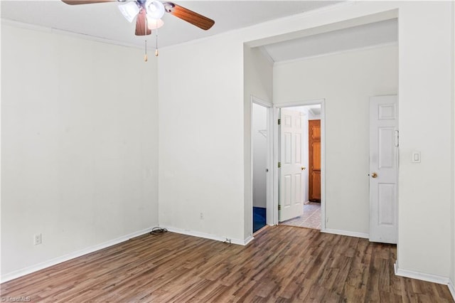 103 Forest Dr, King, NC 27021 - spare room with a ceiling fan, wood finished floors, and crown molding