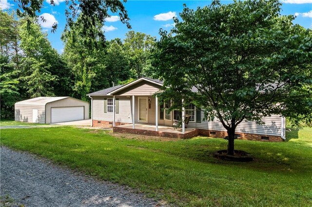 103 Forest Dr, King, NC 27021 - ranch-style home with crawl space, a garage, an outdoor structure, and a front yard