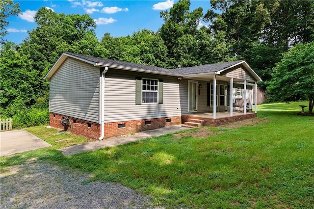 103 Forest Dr, King, NC 27021 - view of front facade with crawl space, a porch, and a front lawn