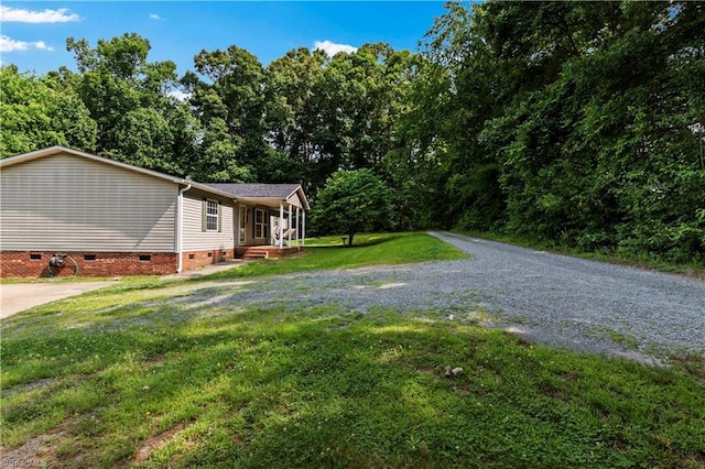 103 Forest Dr, King, NC 27021 - view of property exterior with crawl space and a lawn