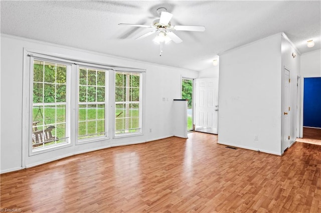 103 Forest Dr, King, NC 27021 - spare room with a ceiling fan, light wood-type flooring, a textured ceiling, and ornamental molding