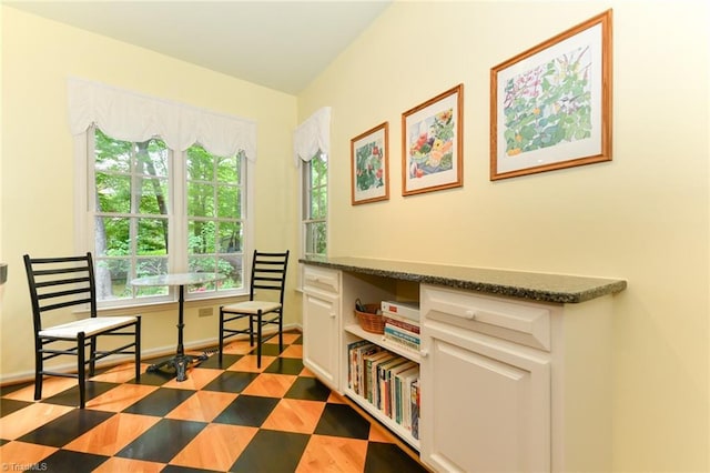 sitting room featuring baseboards