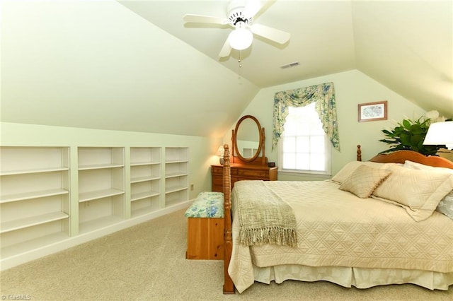 bedroom featuring ceiling fan, carpet, lofted ceiling, and visible vents