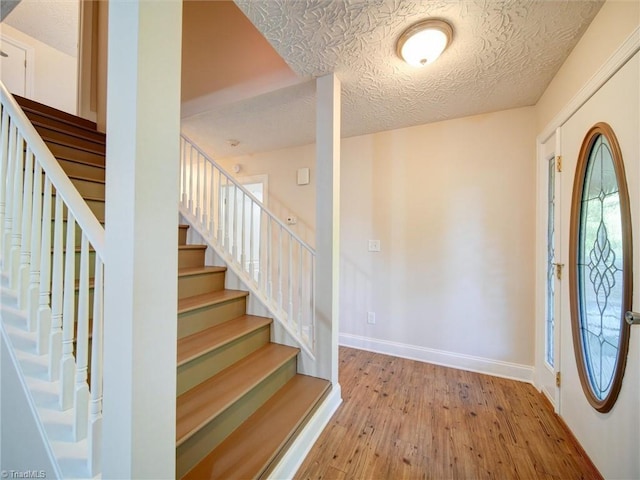 foyer featuring light wood-type flooring