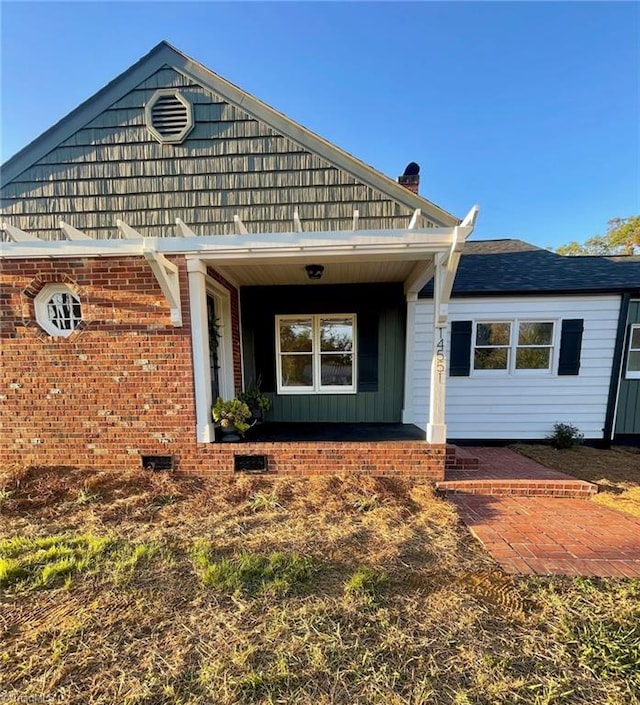 exterior space featuring covered porch