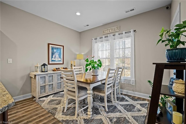 dining room featuring hardwood / wood-style flooring