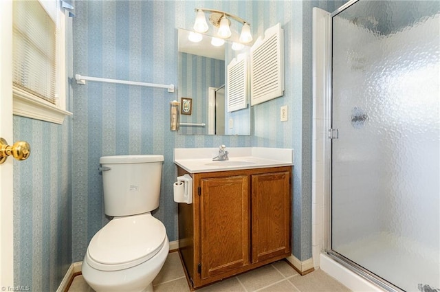 1305 Glen Raven Ct, Greensboro, NC 27410 - bathroom with toilet, a stall shower, tile patterned floors, vanity, and baseboards