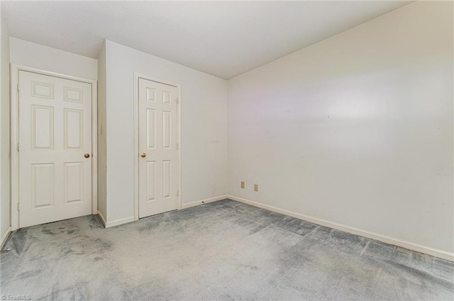 1305 Glen Raven Ct, Greensboro, NC 27410 - unfurnished bedroom with carpet floors and baseboards