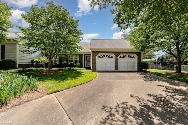 1305 Glen Raven Ct, Greensboro, NC 27410 - view of front of house with an attached garage and driveway