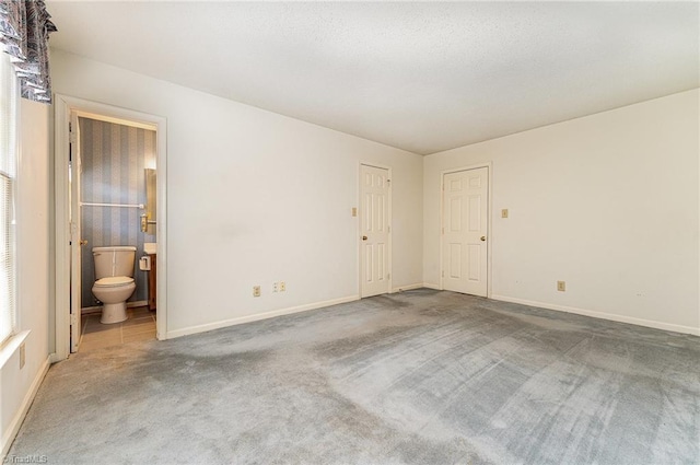 1305 Glen Raven Ct, Greensboro, NC 27410 - empty room featuring carpet flooring and baseboards