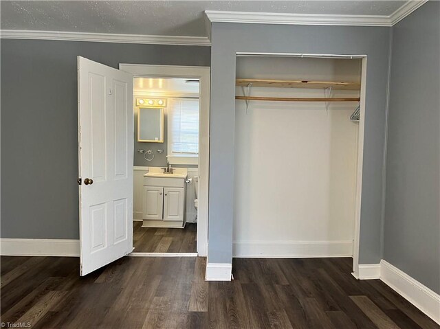 1328 W Ridge St, Ramseur, NC 27316 - bathroom featuring toilet, wood finished floors, and baseboards