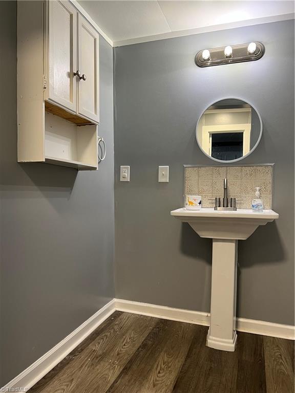 bathroom featuring wood-type flooring