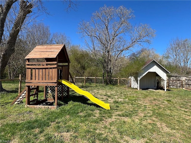 view of yard with a playground, a shed, and an outdoor structure