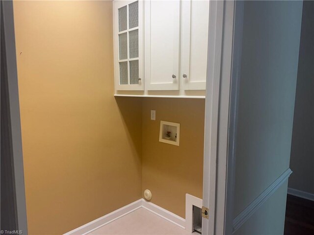 401 Pelican Ln, Clemmons, NC 27012 - laundry room with cabinet space, washer hookup, and baseboards