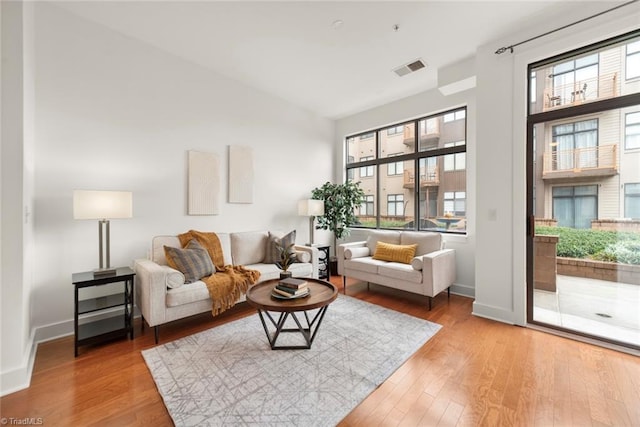 living room with hardwood / wood-style floors