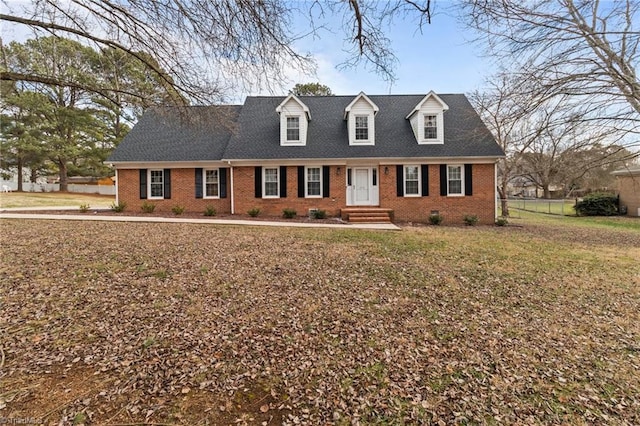 view of new england style home