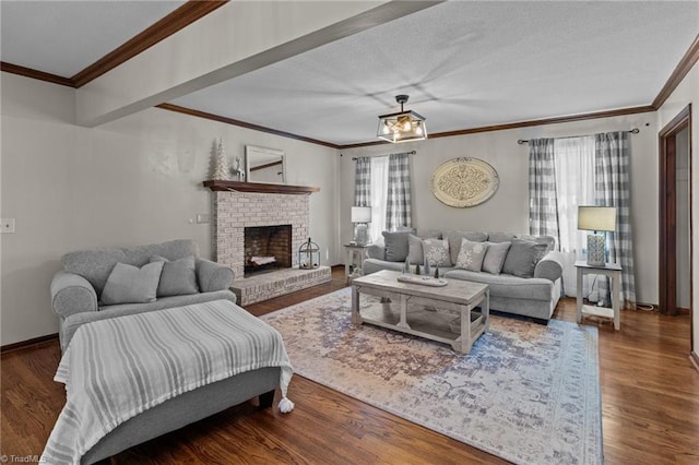 living room with a brick fireplace, dark wood-type flooring, a wealth of natural light, and a textured ceiling