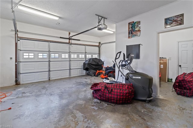 garage featuring a garage door opener