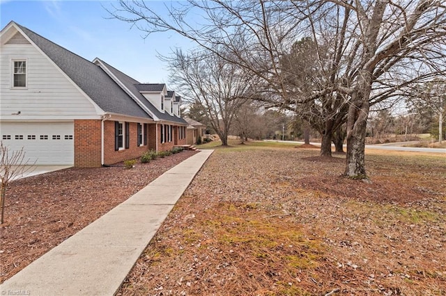 view of property exterior featuring a garage