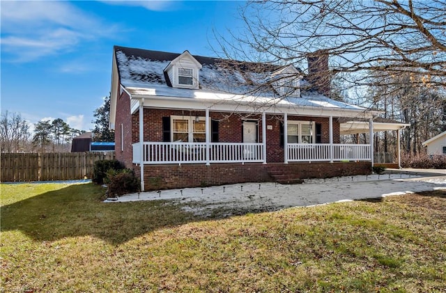 view of front of home featuring a porch and a front lawn