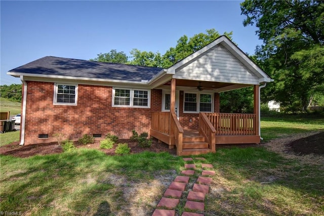 714 Martin St, Greensboro, NC 27406 - exterior space featuring brick siding, a ceiling fan, crawl space, and a front yard