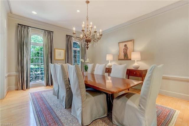 10 Sunfish Pt, Greensboro, NC 27455 - dining room with a chandelier, light wood-style floors, crown molding, baseboards, and recessed lighting