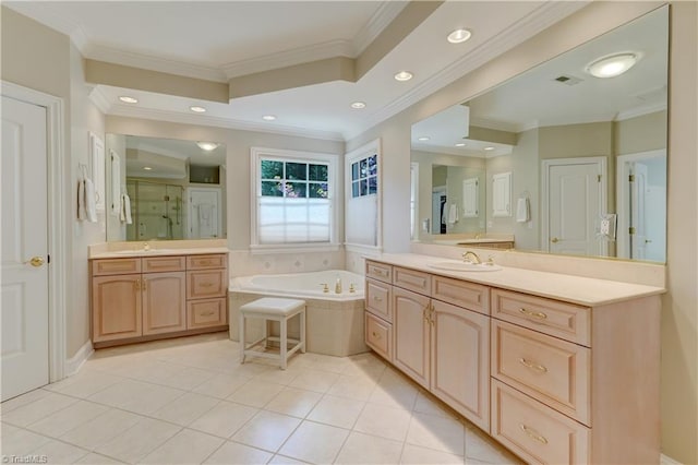 10 Sunfish Pt, Greensboro, NC 27455 - full bathroom featuring a shower stall, two vanities, a garden tub, ornamental molding, and tile patterned flooring