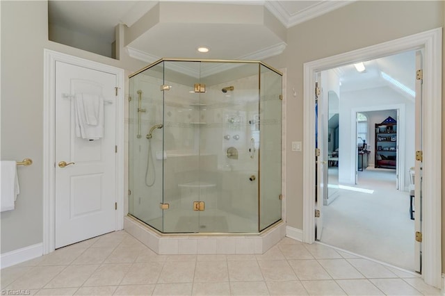 10 Sunfish Pt, Greensboro, NC 27455 - full bath featuring ornamental molding, a stall shower, tile patterned floors, and baseboards