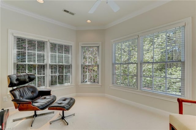 10 Sunfish Pt, Greensboro, NC 27455 - sitting room featuring plenty of natural light, ornamental molding, carpet, a ceiling fan, and baseboards