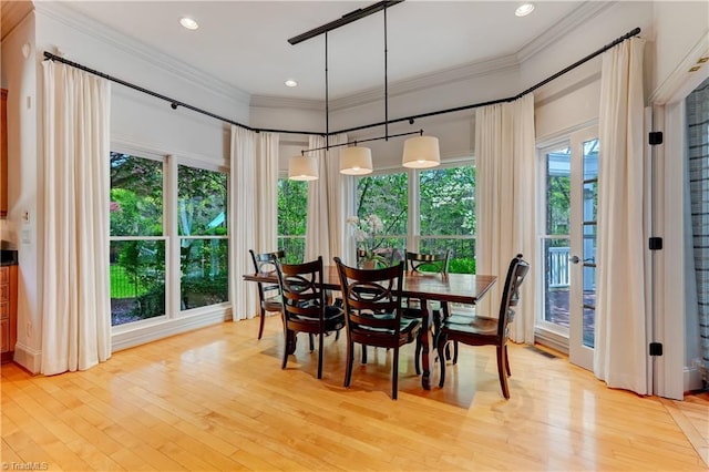 10 Sunfish Pt, Greensboro, NC 27455 - dining area with crown molding, light wood finished floors, and recessed lighting