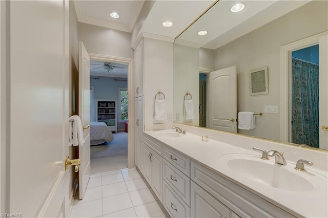 10 Sunfish Pt, Greensboro, NC 27455 - ensuite bathroom with crown molding, double vanity, tile patterned floors, and recessed lighting