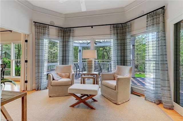 10 Sunfish Pt, Greensboro, NC 27455 - sitting room featuring crown molding, ceiling fan, and wood finished floors