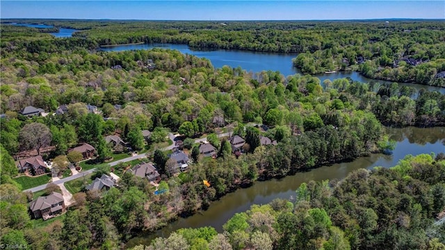 10 Sunfish Pt, Greensboro, NC 27455 - aerial view of property and surrounding area featuring a heavily wooded area and a large body of water