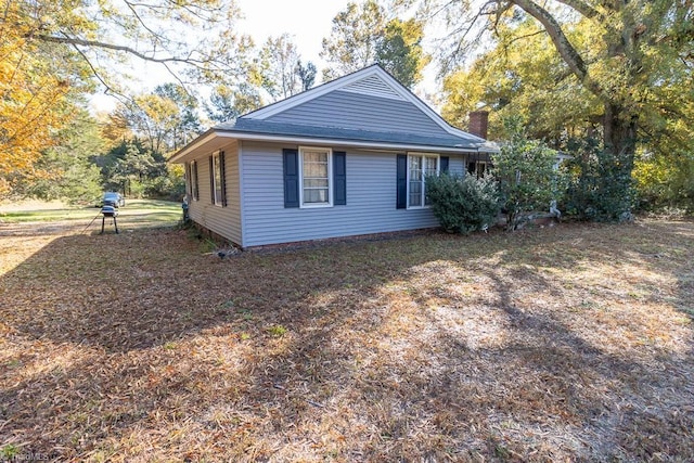 5509,5505,5505zz,5509zz, Drake Road, Greensboro, NC 27406 - view of side of home featuring a chimney