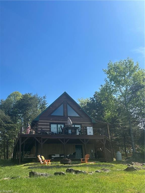 217 Fairview Dr, Traphill, NC 28685 - rear view of house with a lawn and a deck