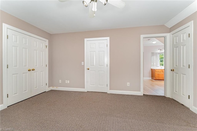 4335 Clovelly Dr, Greensboro, NC 27406 - unfurnished bedroom with carpet flooring, a ceiling fan, and ensuite bathroom