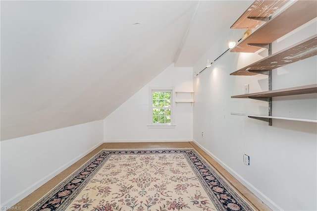 4335 Clovelly Dr, Greensboro, NC 27406 - additional living space with vaulted ceiling and baseboards